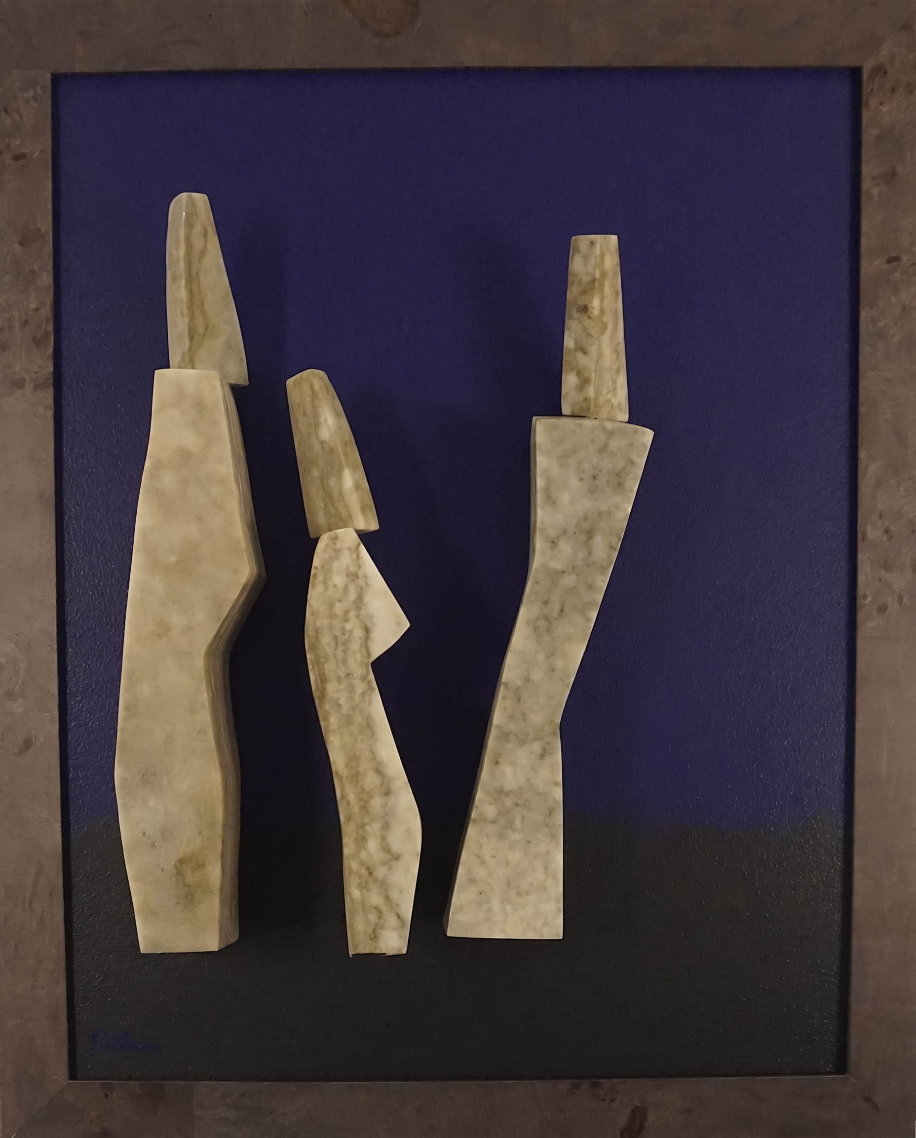 Air, Hand-cut stone figures on artist-built panel, hardwood frame